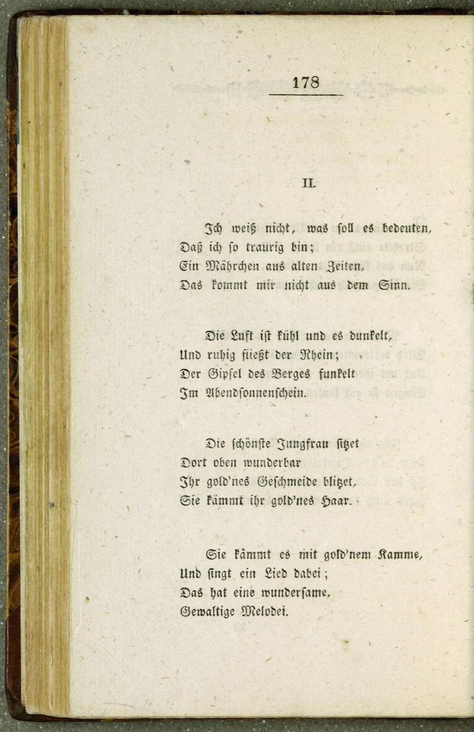 Vergilbte Druckseite 178 mit der Nummer II und den ersten vier Strophen von Heines Loreley-Gedicht in Fraktur.